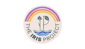 Image contains a tan circle. Inside at the top are three arches, from top to bottom: purple, orange, and yellow. Green text at the bottom of the circle reads "The Iris Project." In the middle of the circle is an illustration of waves and the letters I and P with floral elements.